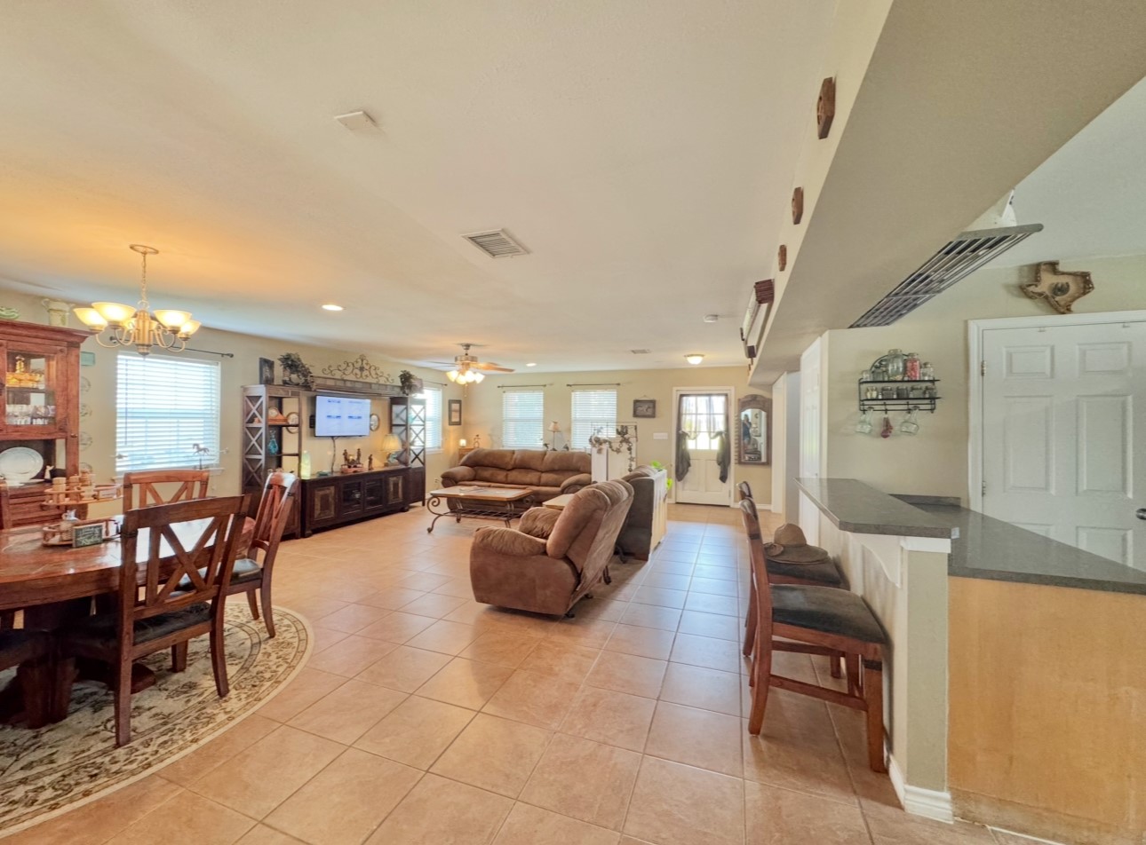 2334 County Road 464 Elgin, TX 78621 - Photo 5 of 39 a living room with furniture and view of kitchen