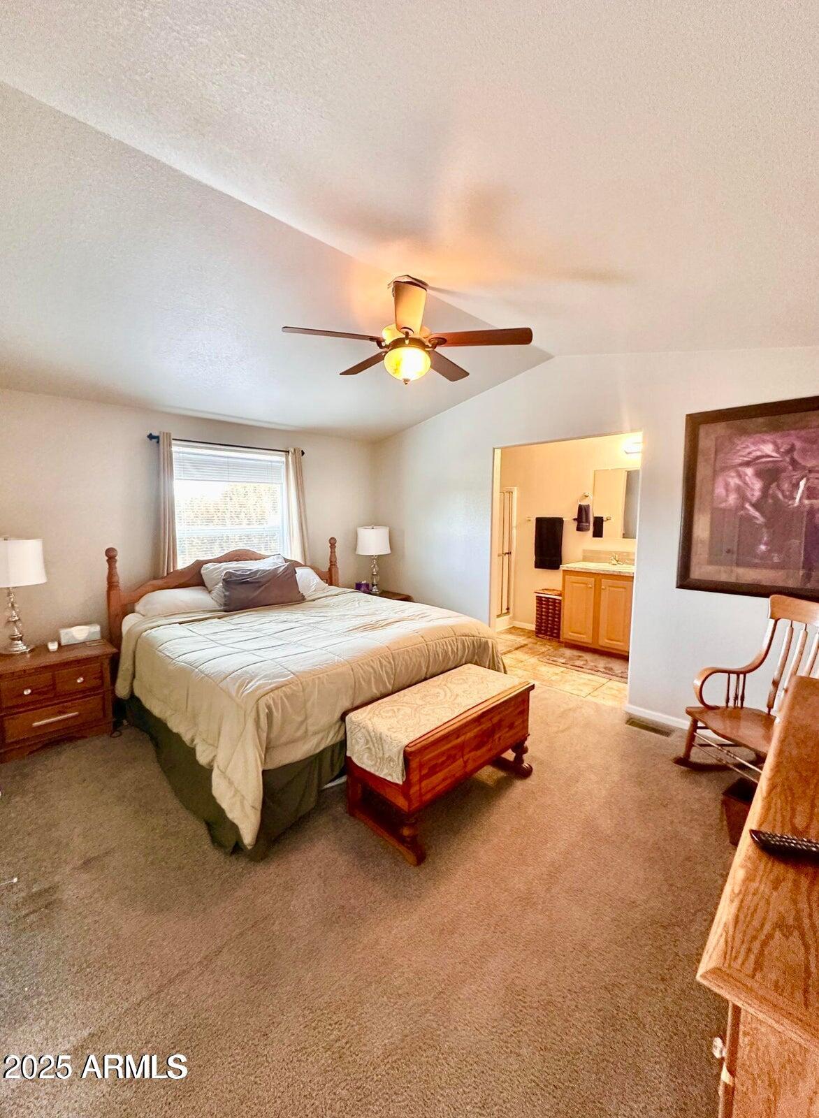 8102 White Mountain Lake Road Show Low, AZ 85901 - Photo 5 of 8 a bedroom with a bed and furniture