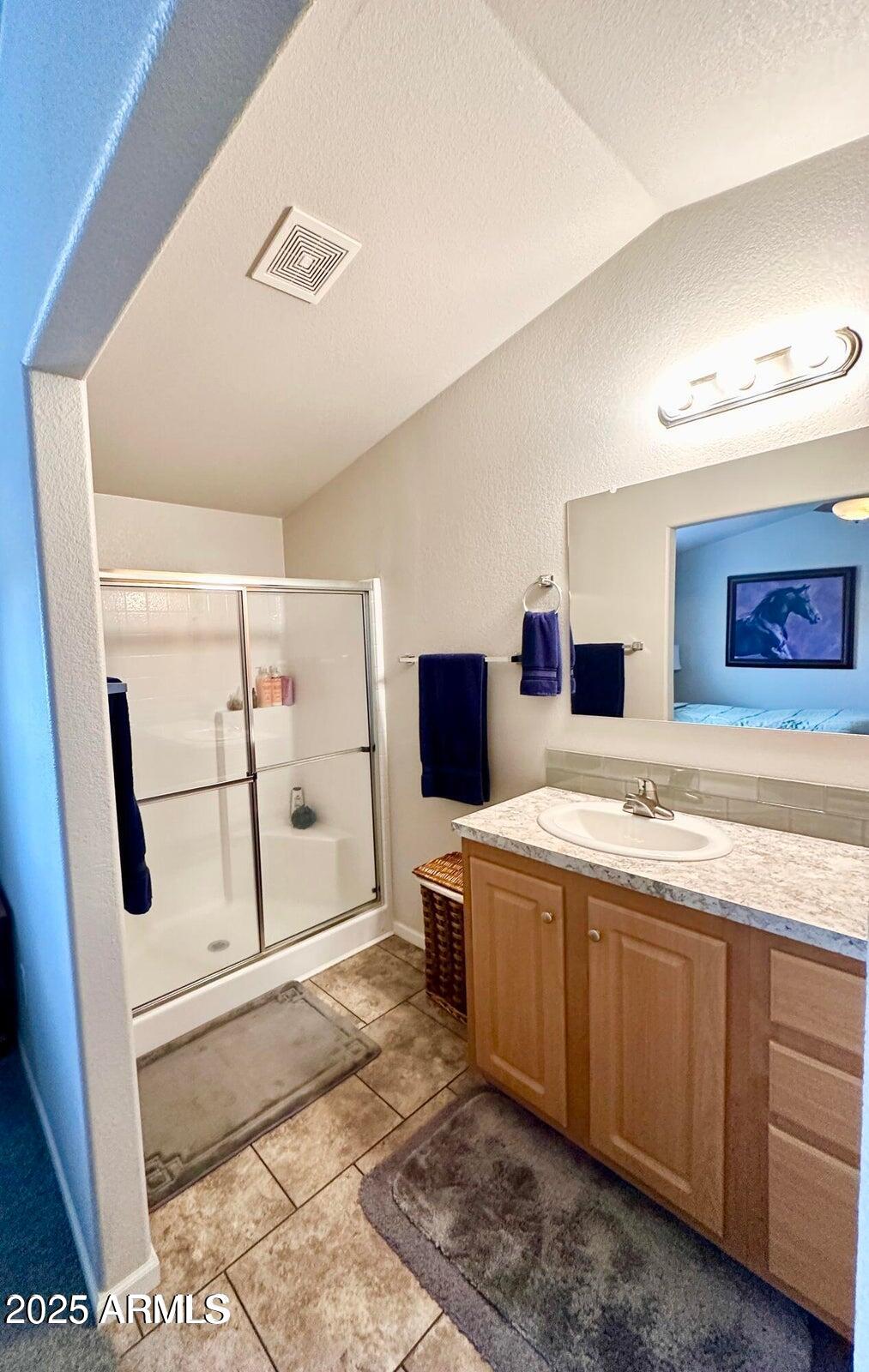 8102 White Mountain Lake Road Show Low, AZ 85901 - Photo 6 of 8 a bathroom with a sink and mirror