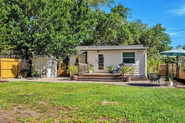 a front view of house with yard and seating area
