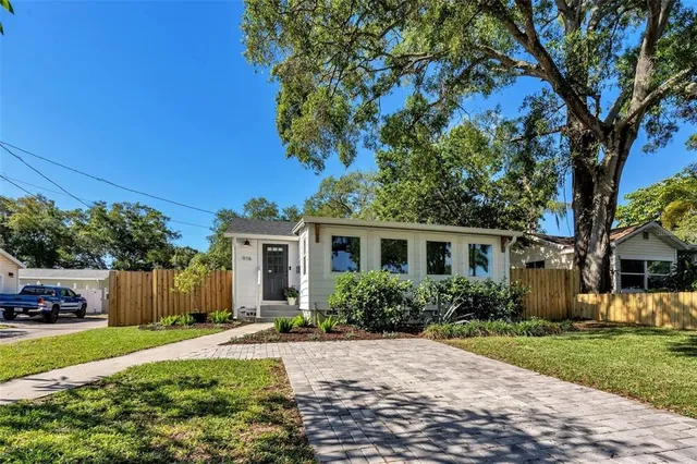 front view of a house with a yard