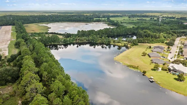 a view of a lake with a city view