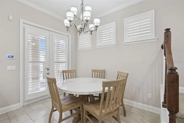 a kitchen with stainless steel appliances granite countertop a sink and a refrigerator