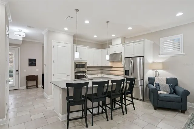 a bathroom with a sink a mirror and a toilet
