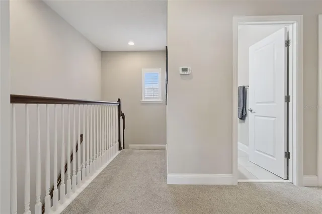 a bathroom with a sink vanity granite and a mirror