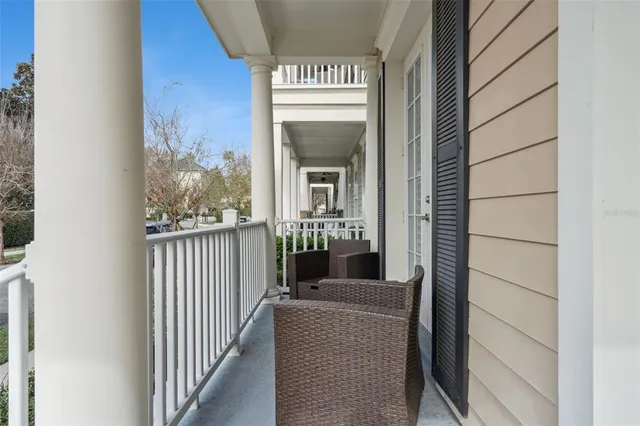 a outdoor living space with patio furniture and a potted plant