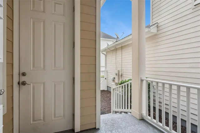a view of a livingroom with furniture and a flat screen tv