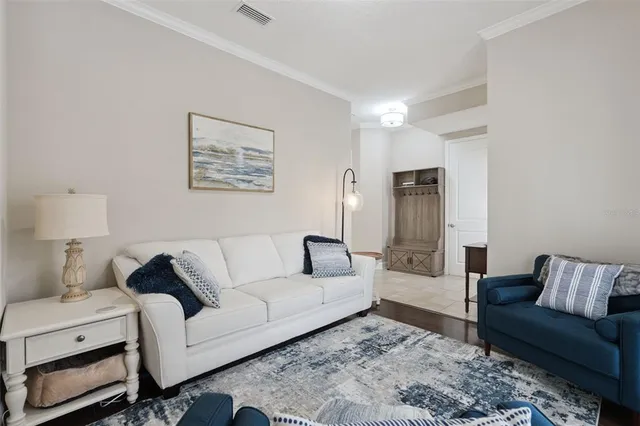 a living room with furniture and a couch