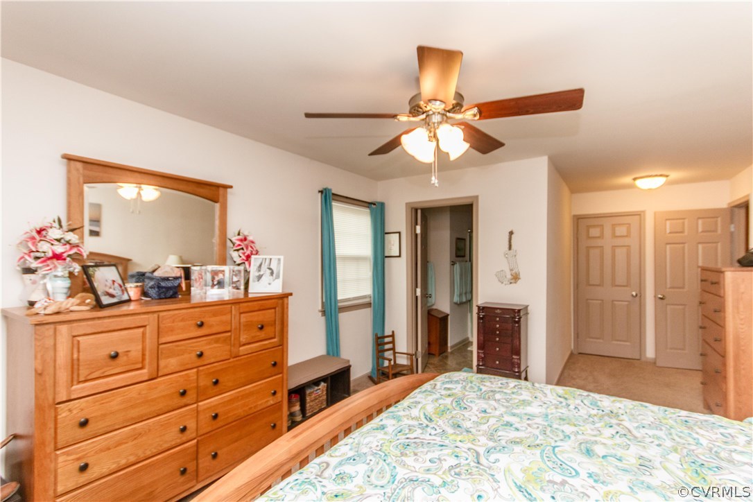 1101 Covington Road Colonial Heights, VA 23834 - Photo 23 of 47 a bedroom with a bed and a dresser in it