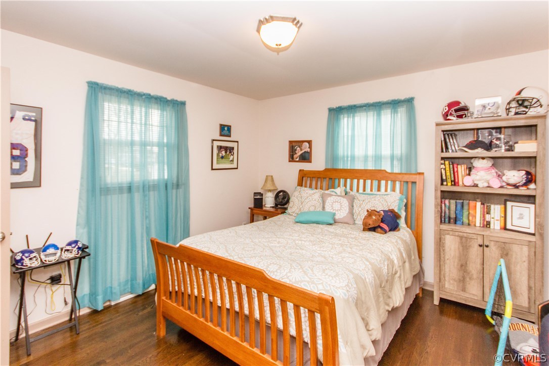 1101 Covington Road Colonial Heights, VA 23834 - Photo 28 of 47 a bedroom with a bed and a table in it