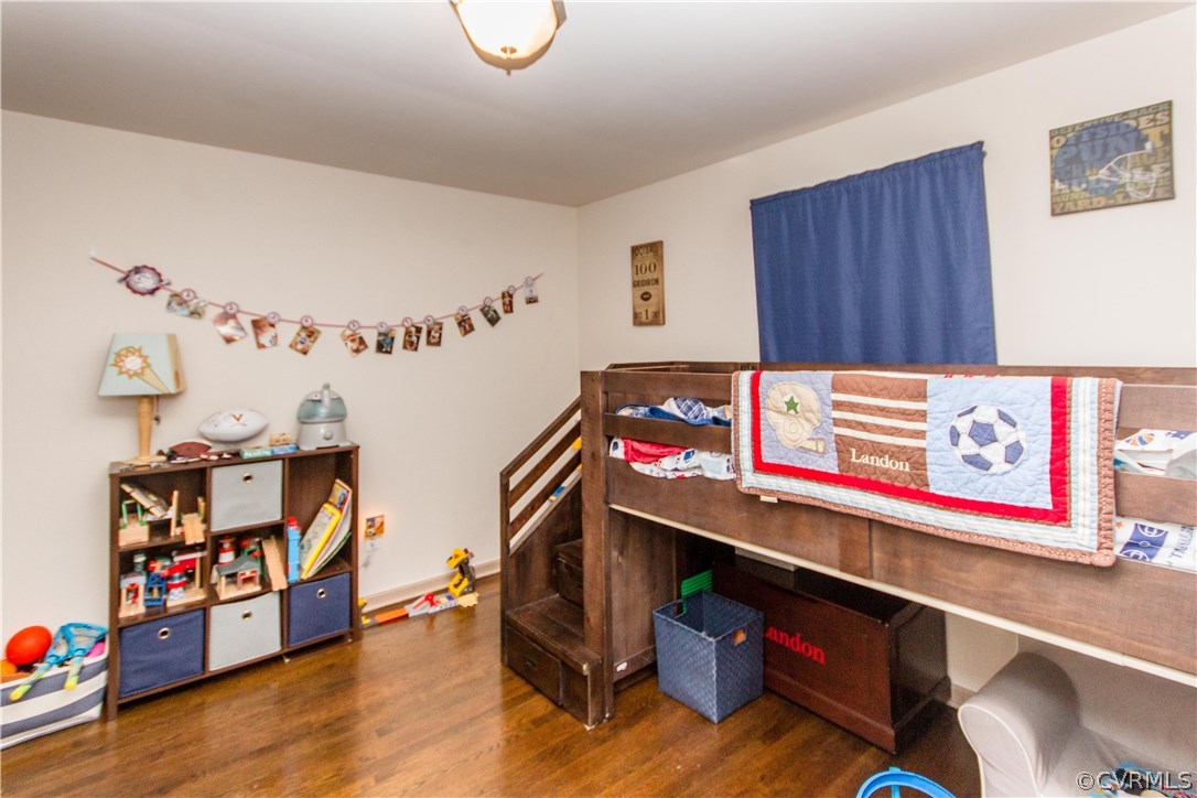 1101 Covington Road Colonial Heights, VA 23834 - Photo 36 of 47 a room with furniture and wooden floor