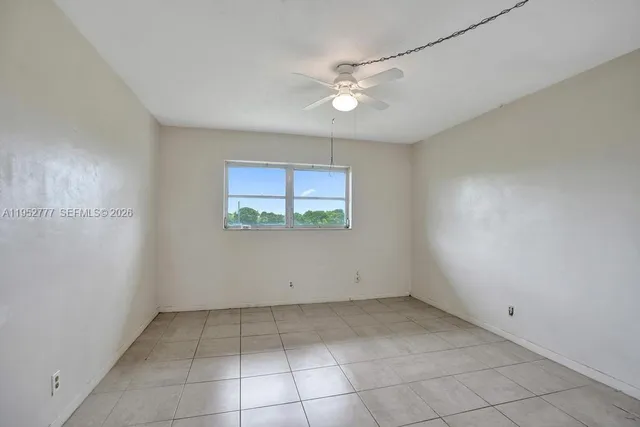 an empty room with a bathroom