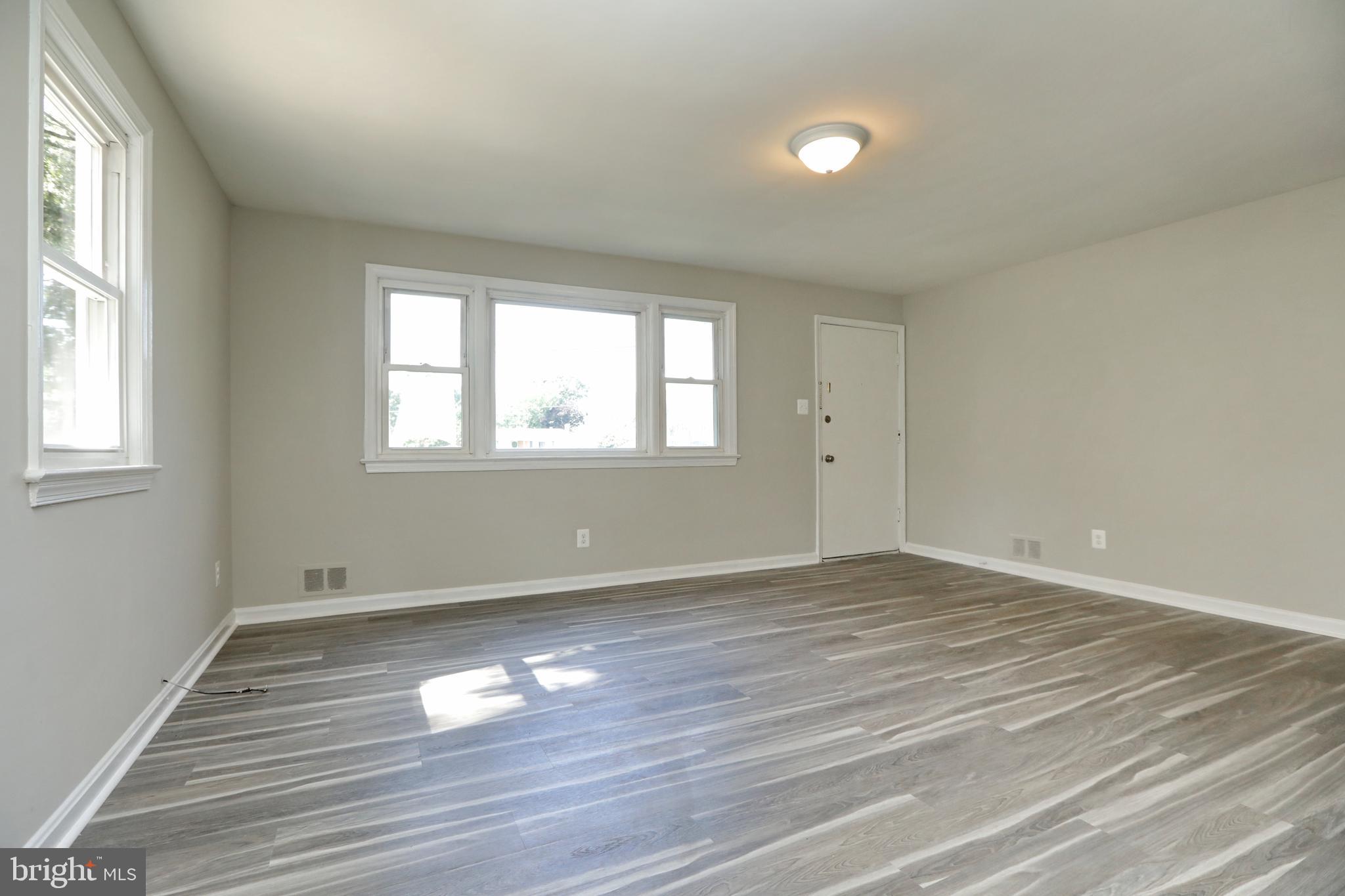 4984 Leonardtown Road Waldorf, MD 20601 - Photo 6 of 23 Living Room looking back to front door