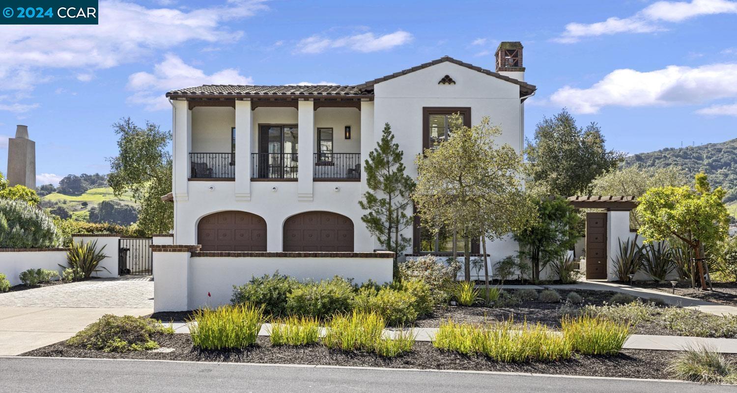 a house view with a garden space