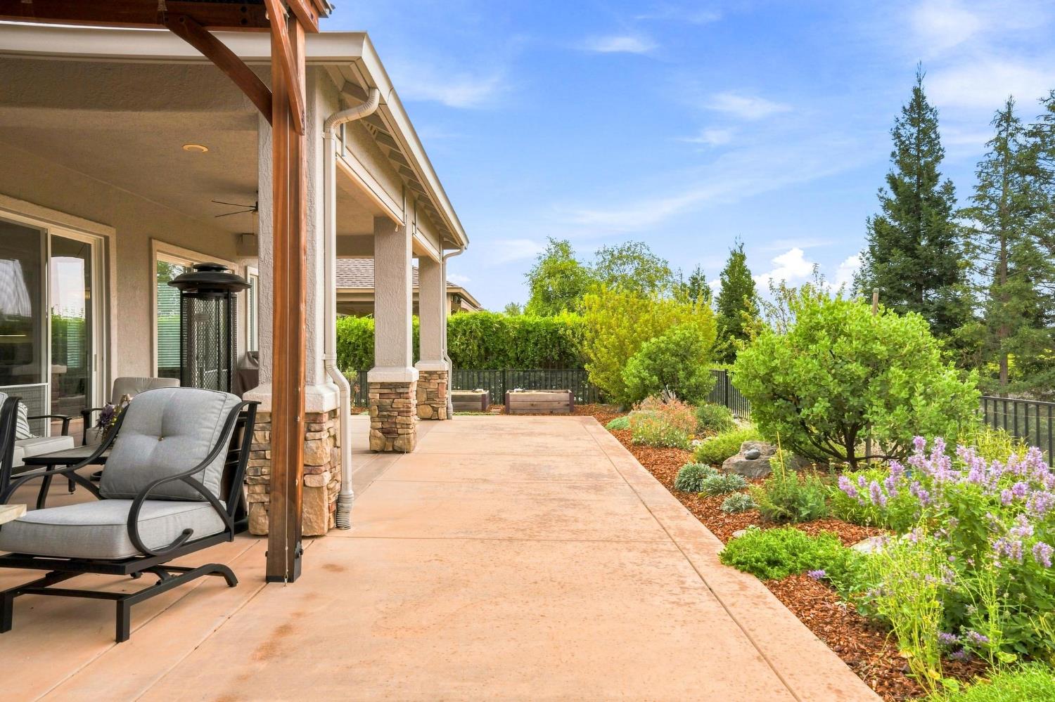 217 Rock Ridge Lane Copperopolis, CA 95228 - Photo 17 of 55 Covered Patio and extended patio area for entertaining.
