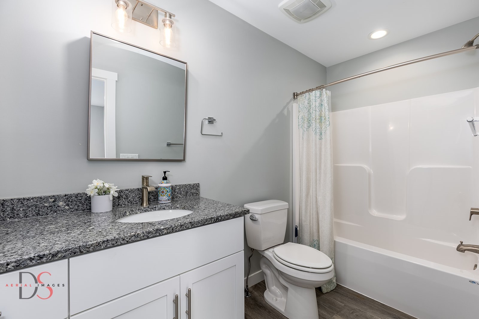 28 Waterside Way Ottawa, IL 61350 - Photo 20 of 29 a bathroom with a granite countertop toilet sink and a mirror