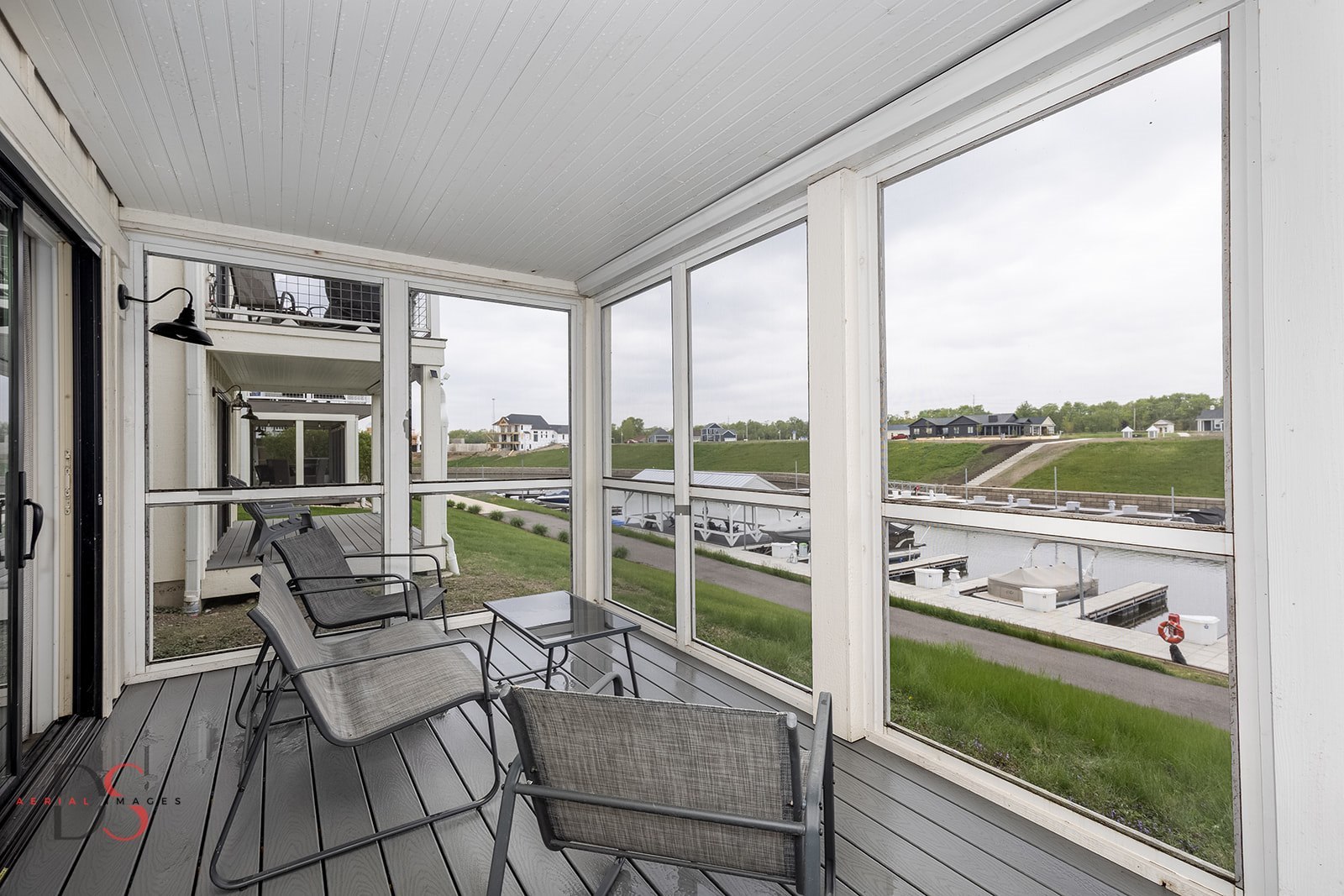 28 Waterside Way Ottawa, IL 61350 - Photo 25 of 29 a living room with furniture and floor to ceiling windows