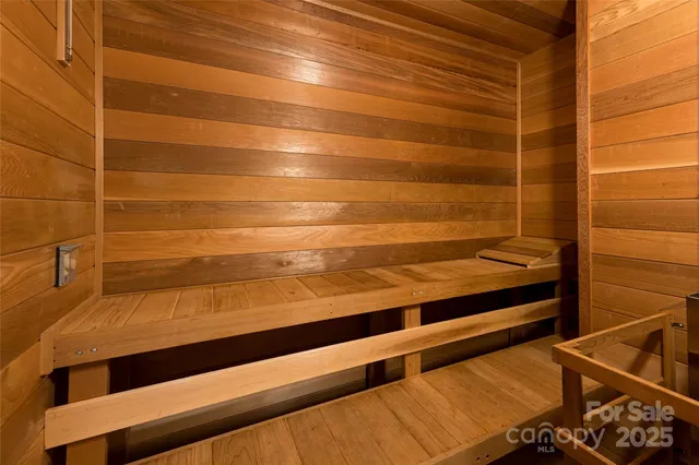 a view of a building with sitting area and porch