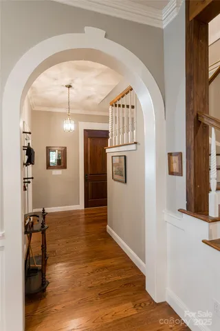 a large kitchen with a table and chairs