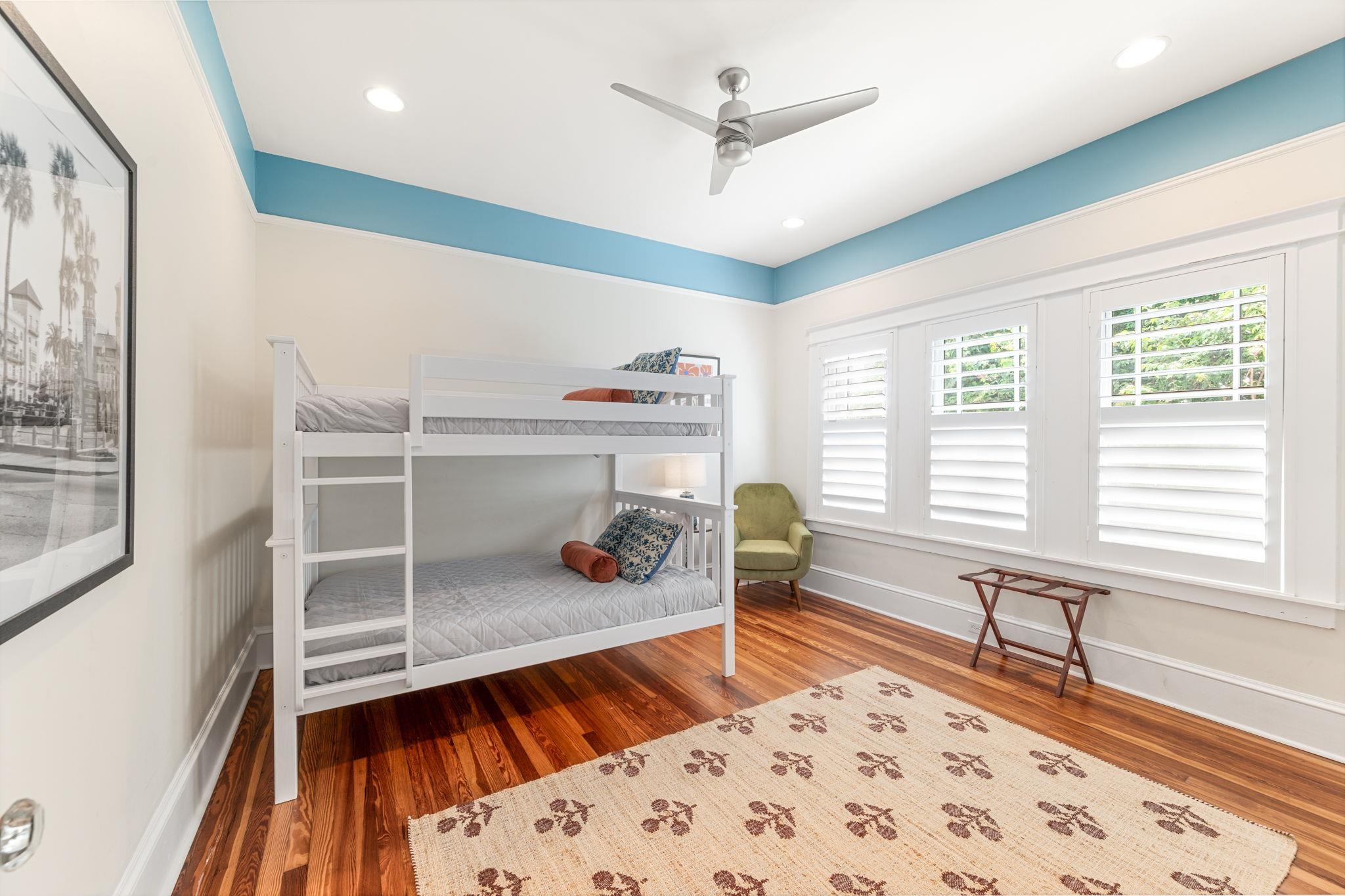 20 Riberia Street St. Augustine, FL 32084 - Photo 27 of 56 a living room with a couch and wooden floor