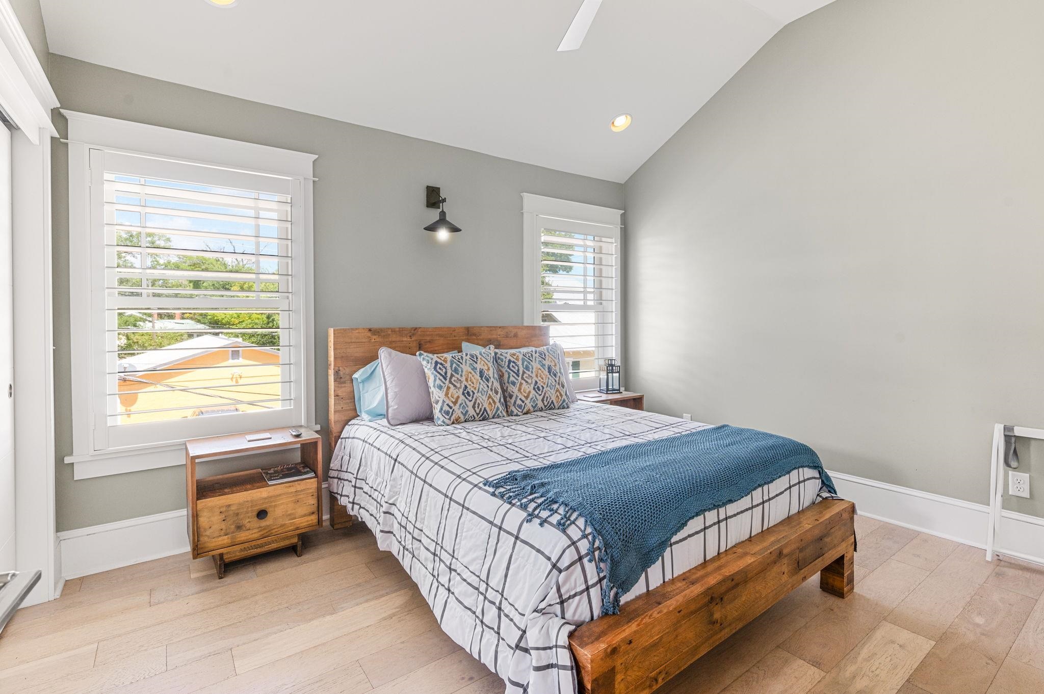 20 Riberia Street St. Augustine, FL 32084 - Photo 39 of 56 a bedroom with a bed and a window