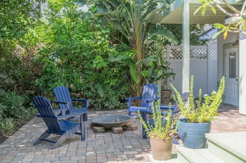a view of an empty room with windows