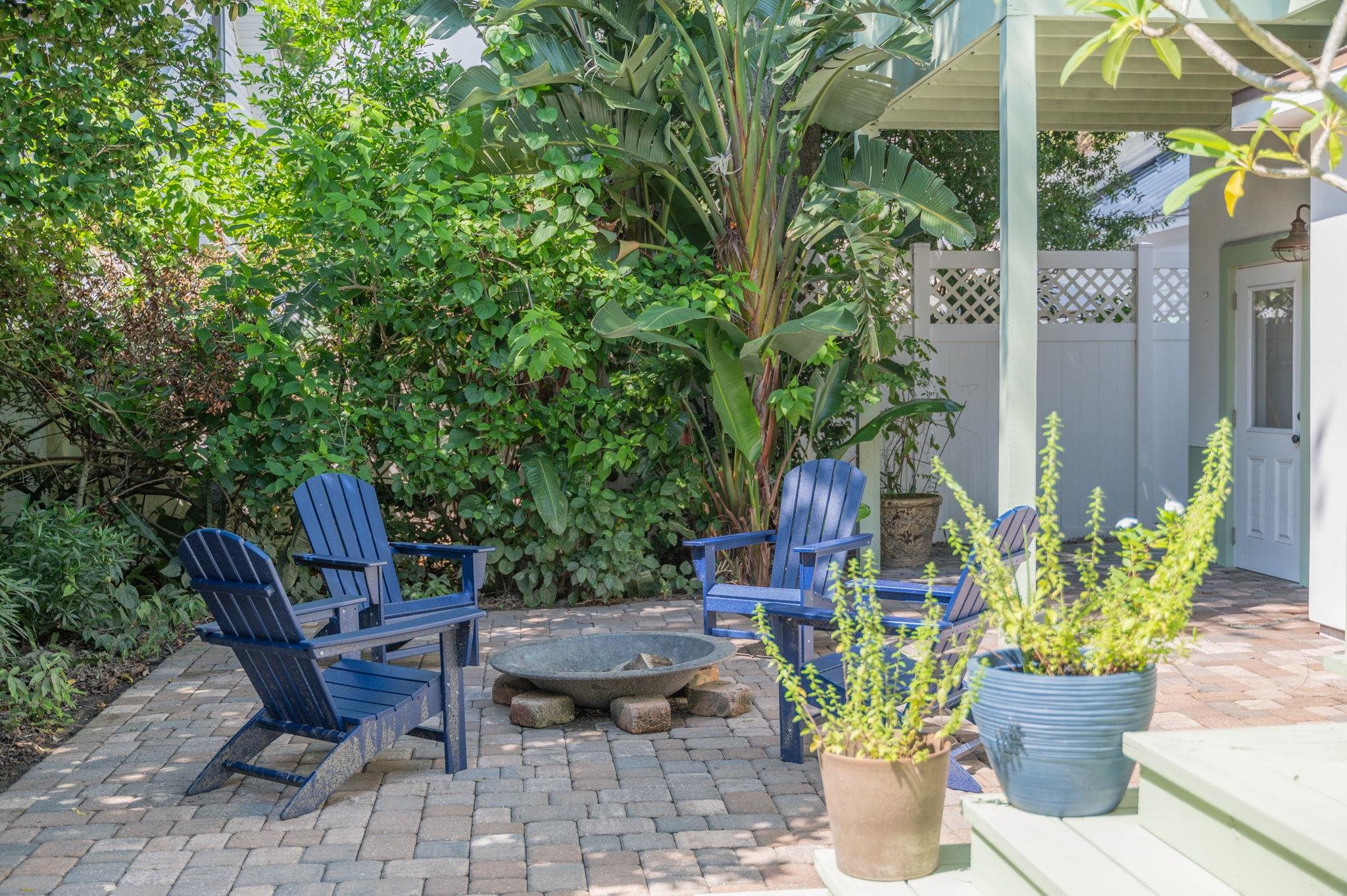 20 Riberia Street St. Augustine, FL 32084 - Photo 48 of 56 a view of a chair and table in backyard