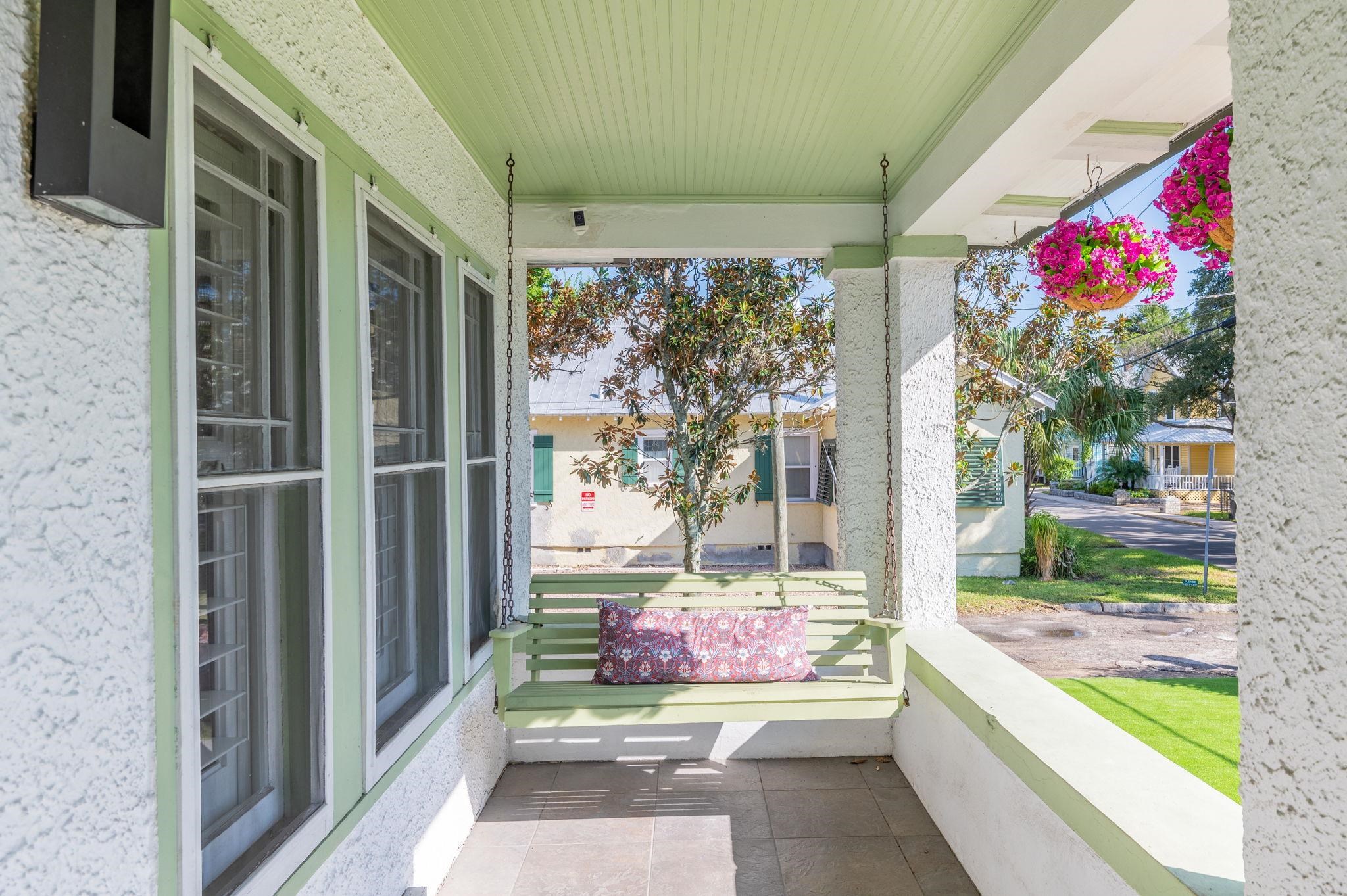 20 Riberia Street St. Augustine, FL 32084 - Photo 8 of 56 a front view of a house with outdoor sitting space