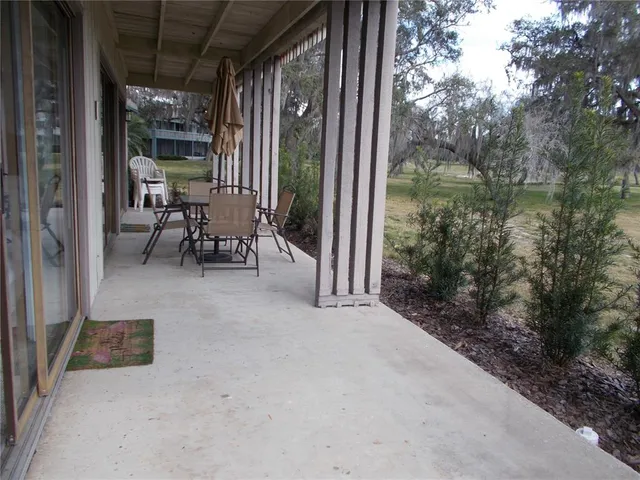 a view of a swimming pool with a backyard
