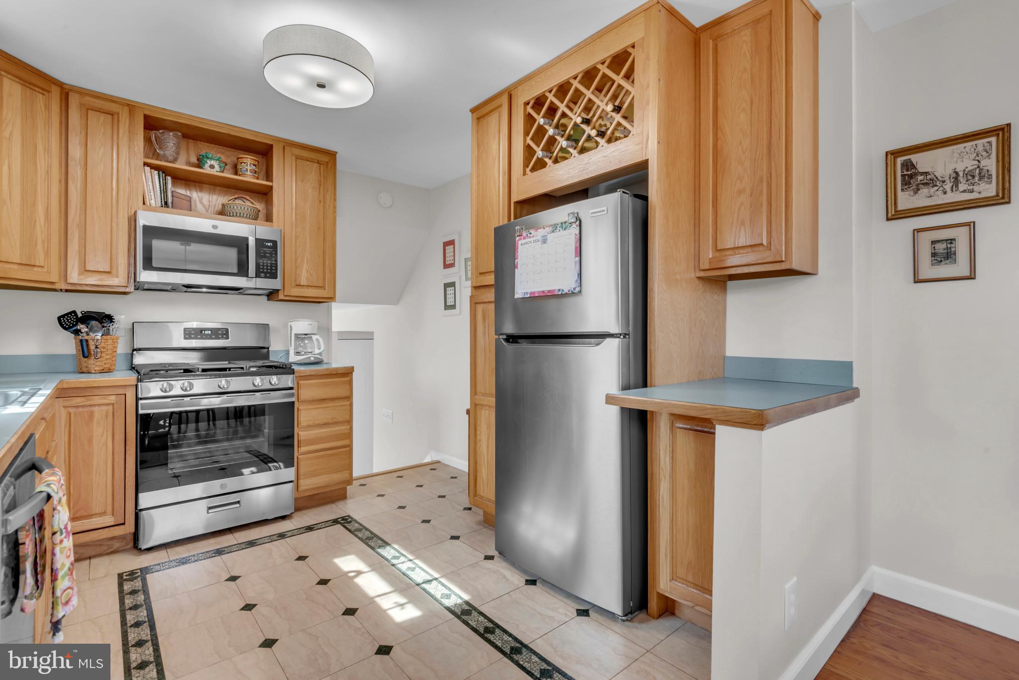 5 Spring Haven Court Severna Park, MD 21146 - Photo 11 of 35 a kitchen with stainless steel appliances granite countertop a refrigerator and a stove top oven