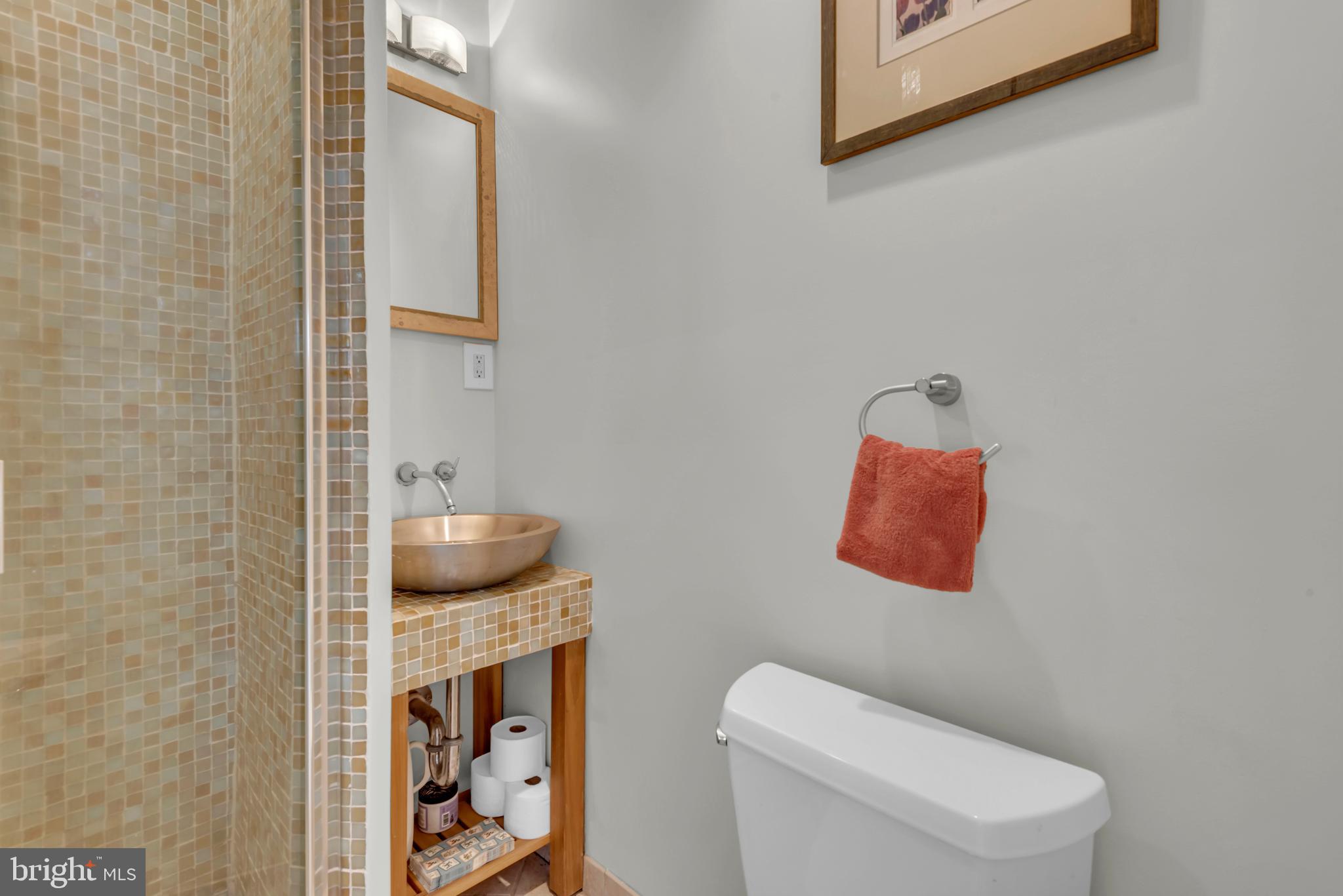 5 Spring Haven Court Severna Park, MD 21146 - Photo 19 of 35 a bathroom with a toilet and a sink