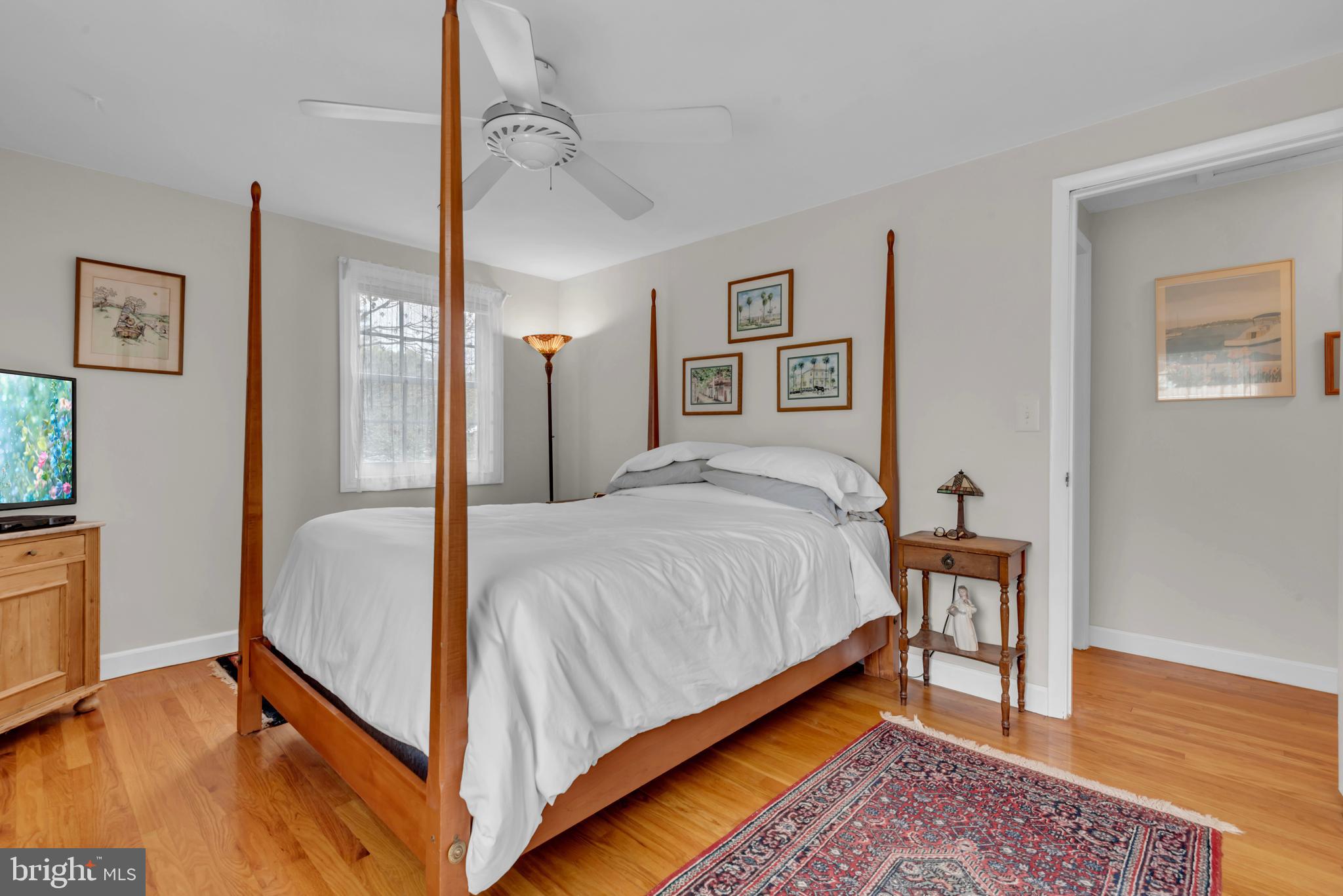 5 Spring Haven Court Severna Park, MD 21146 - Photo 21 of 35 a bed room with a bed and a lamp