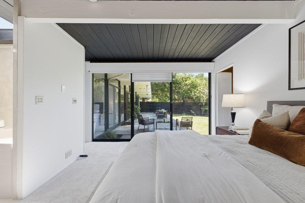 2203 Allegheny Way San Mateo, CA 94402 - Photo 20 of 56 a bed room with a bed and a large window