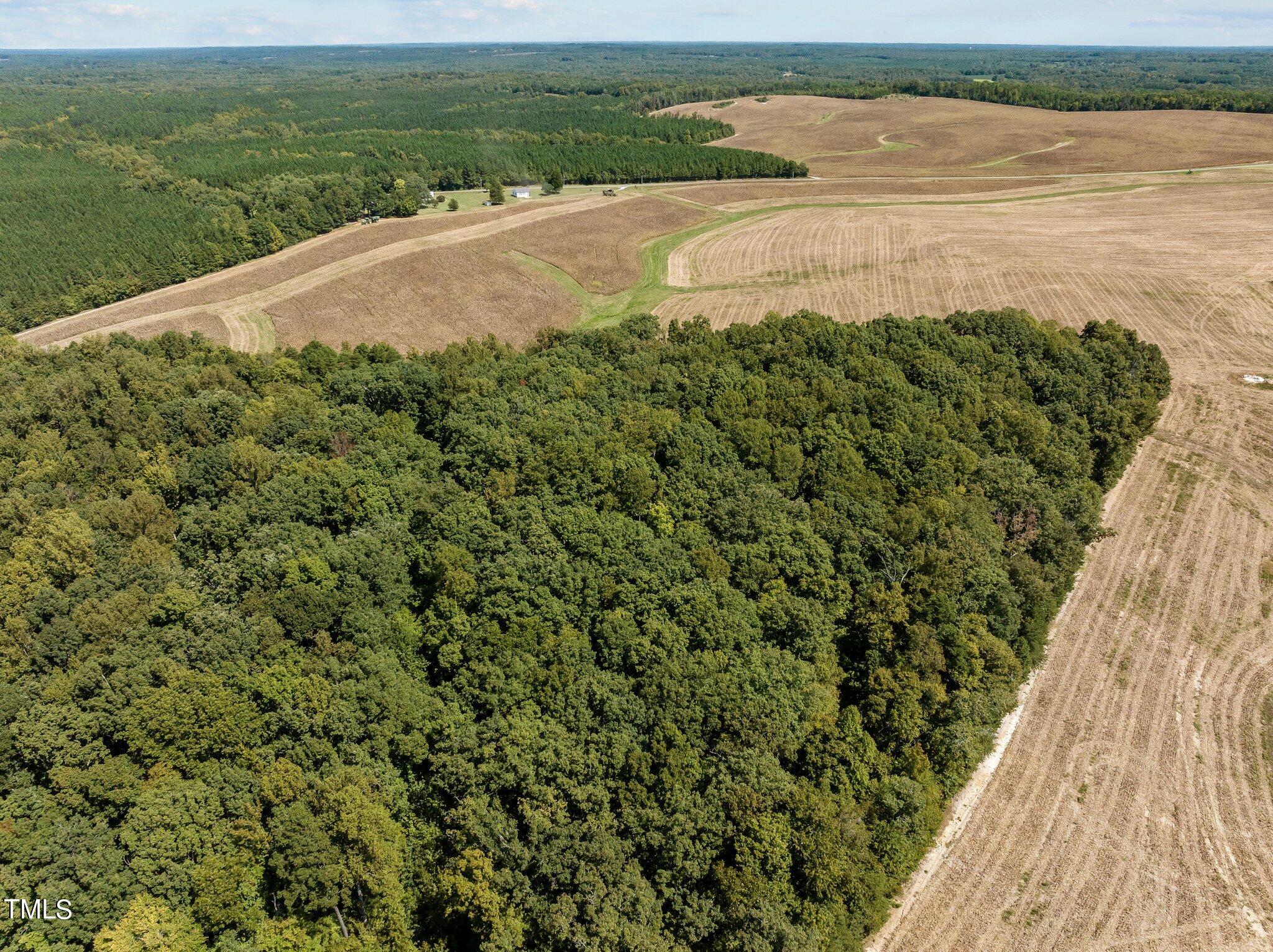 17.03-ac New Mayo Drive Roxboro, NC 27574 - Photo 7 of 14 a view of an ocean and beach