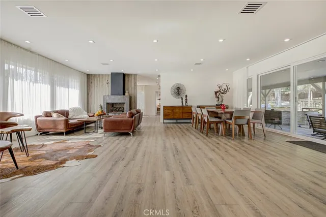 a view of street and electric pole on its side