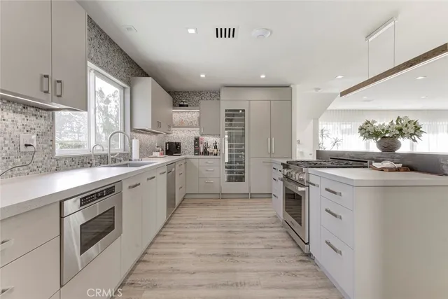 a view of a swimming pool with a lounge chairs