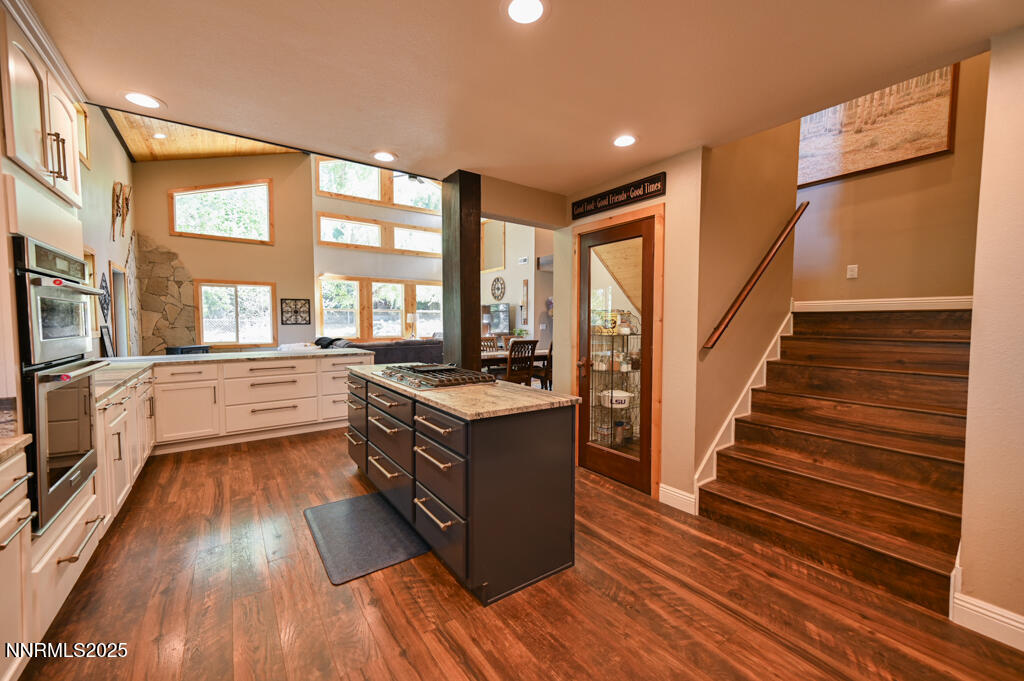 1147 Autumn Hills Road Gardnerville, NV 89460 - Photo 18 of 53 a kitchen with wooden floors and a sink