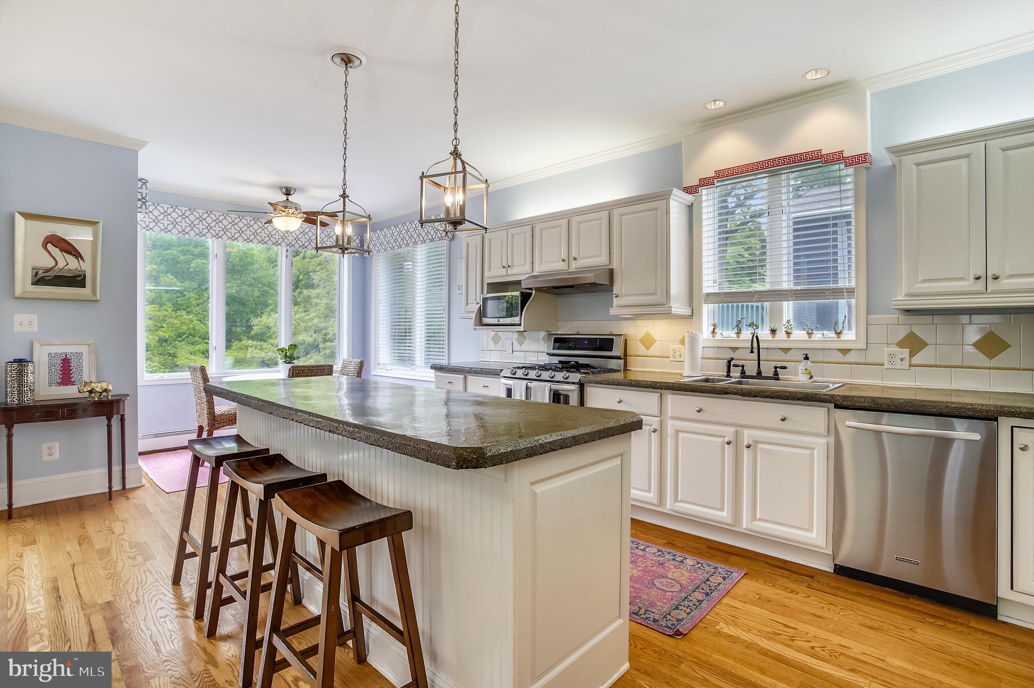 1512 Berwick Road Towson, MD 21204 - Photo 7 of 49 Gather at the island with new pendant lights