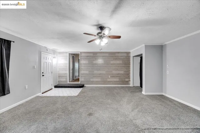 a view of a livingroom with a flat screen tv