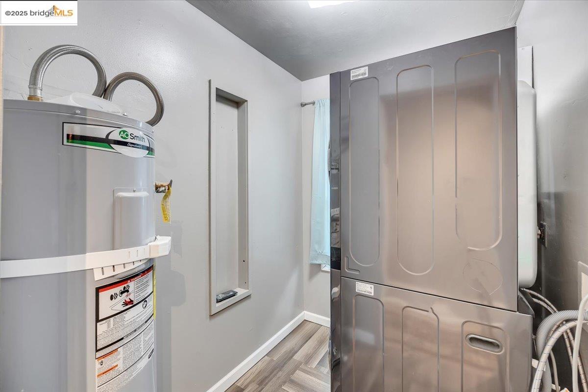 21980 Montgomery Road Sonora, CA 95370 - Photo 27 of 52 Utilities with electric water heater and estacked washer and dryer