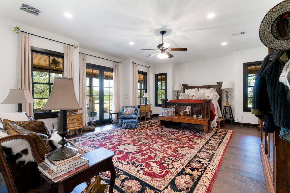 4073 Bell Springs Road Dripping Springs, TX 78620 - Photo 26 of 38 a bed room with furniture and a window