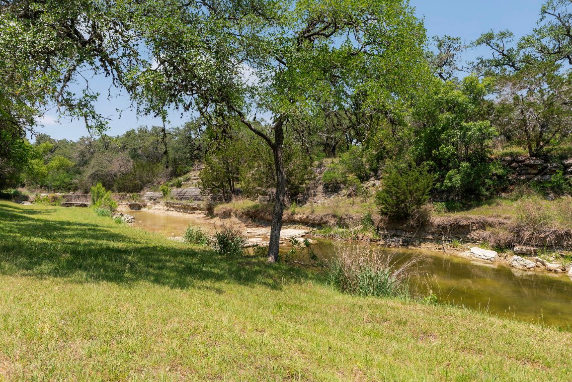 4073 Bell Springs Road Dripping Springs, TX 78620 - Photo 5 of 38 a view of a lake with houses