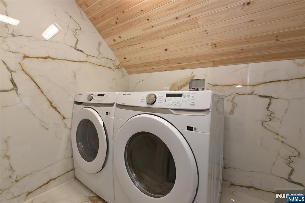454 Park Avenue, Unit 2 Rutherford, NJ 07070 - Photo 5 of 27 a utility room with dryer and washer