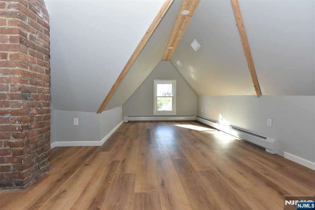 454 Park Avenue, Unit 2 Rutherford, NJ 07070 - Photo 9 of 27 a view of an empty room and window
