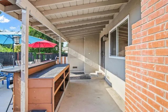 a view of balcony with patio