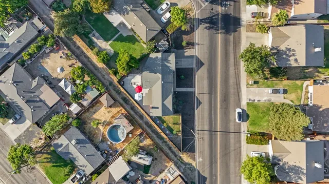 an aerial view of residential building and lake view