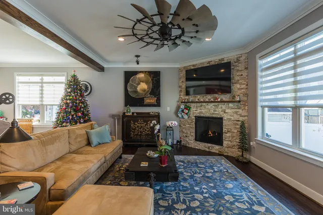 a picture of a very nice looking living room with a large window