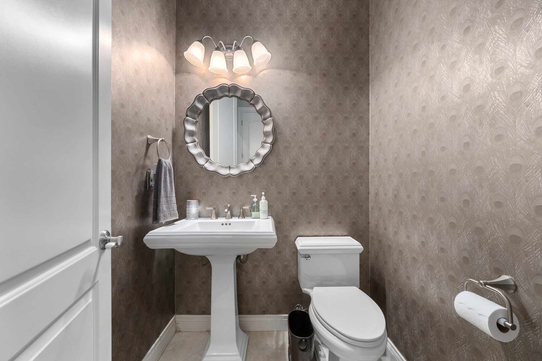 29 Meadows End Georgetown, TX 78628 - Photo 21 of 38 a bathroom with a toilet sink and mirror