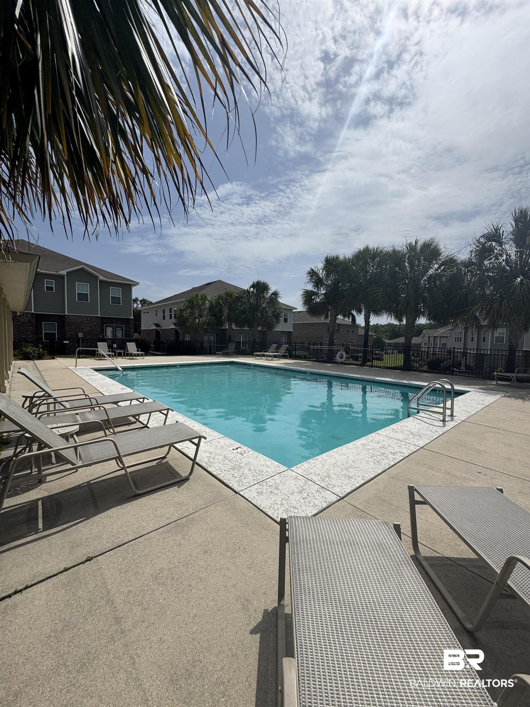 6811 Spaniel Drive, Unit C Daphne, AL 36527 - Photo 27 of 33 Community pool with a patio
