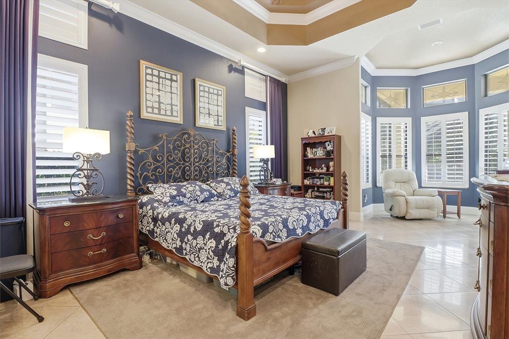 1416 North Ridge Meadow Path Hernando, FL 34442 - Photo 31 of 68 a bed room with a bed and a couch